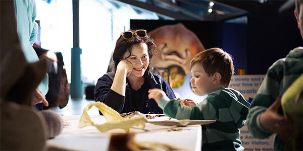 "School children learning about the ocean marine species and conservation at the Aquarium"